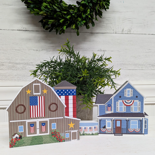 Red, white and blue house and barn wooden buildings