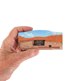 3/4" thick wooden model of Skyline Arch in Arches National Park on white background