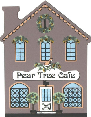 3/4" thick wooden replica of an illustrated house facade with the text 'Pear Tree Cafe' across the front, decorated with wreaths and small trees, on a plain white background.