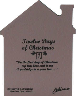 3/4" thick wooden replica of a house in muted taupe-brown with dark printed text reading 'Twelve Days of Christmas' and a quote, plus small decorative icons, on a plain white background.