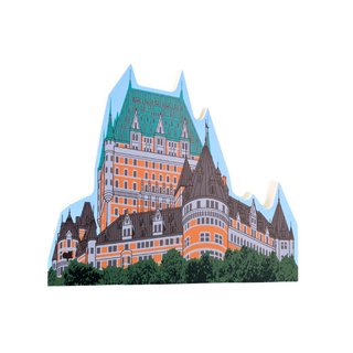 3/4" thick wooden cutout of  a castle-like building with green, orange, and brown colors on a white background.