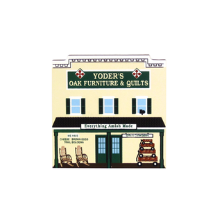 3/4" wooden replica of a store front with 'Yoder's Oak Furniture & Quilts' sign on a white background
