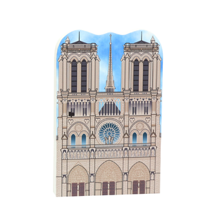3/4" thick wooden replica with an Illustration of  a cathedral with a blue sky background