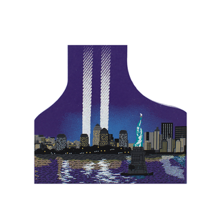 3/4" thick wooden cutout  of a city skyline with the Statue of Liberty at night.