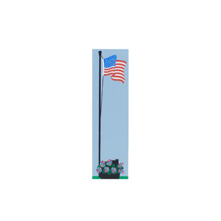 3/4" Wooden replica with a American flag on a pole with a blue sky background