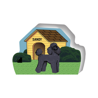 wooden replica of a illustrated black poodle dog standing in front of a dog house