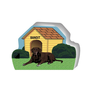 wooden replica of a illustrated brown lab dog standing in front of a dog house