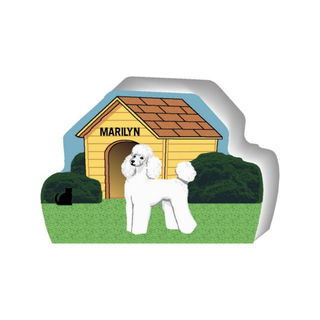 wooden replica of a illustrated white poodle  dog standing in front of a dog house