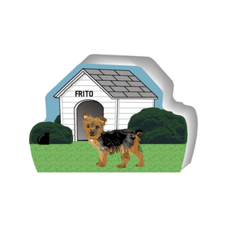 wooden replica of an illustrated brown and black dog standing in front of a dog house