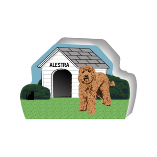 wooden replica of a illustrated brown goldendoodle dog standing in front of a dog house