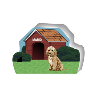 wooden replica of a illustrated light brown and tan long haired dog standing in front of a dog house