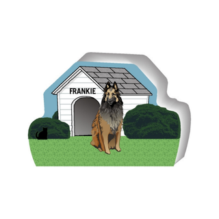 wooden replica of a illustrated brown and black medium sized dog standing in front of a dog house