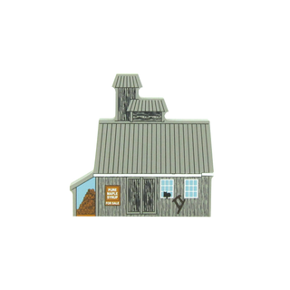 3/4" wooden replica with an illustration of a maple shack with a sign that says pure maple syrup for sale on it 

