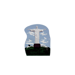 3/4" thick wooden cutout of a figure with outstretched arms against a blue sky with clouds
