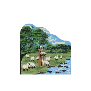 3/4" thick wooden replica with an Illustration of a shepherd with sheep in a pastoral scene