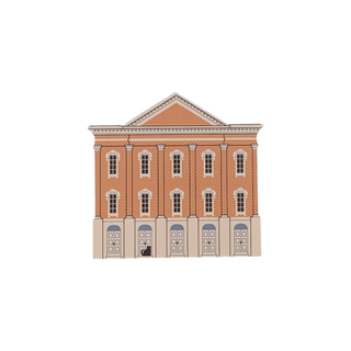 3/4" thick wooden illustration of a model of a brick building with beige trim on a white background