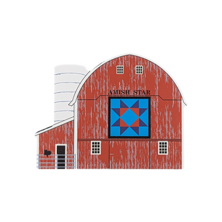 3/4" thick wooden illustration of a red barn with a quilt block on a white background