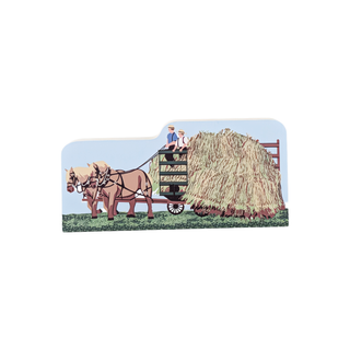 3/4" thick wood model of two horses and two men pulling hay. 