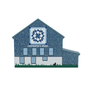 3/4" thick wooden illustration of a blue barn with a quilt block on a white background