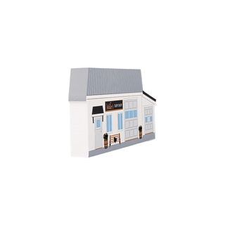 3/4" wooden replica of a building with a gray roof and white walls on a white background