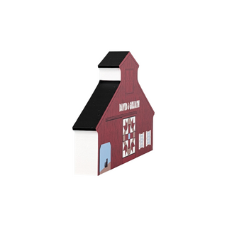 3/4" thick wooden illustration of a red barn with a quilt block on a white background