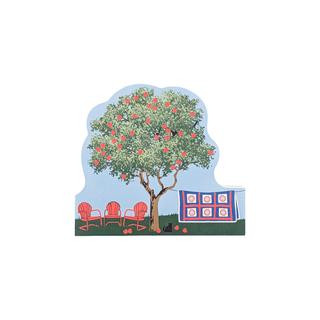 3/4" thick wooden illustration of a tree, chairs, and quilt