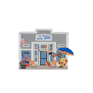 3/4" thick wooden replica of Dr. Gravity's Kite Shop with various kites and flags displayed.