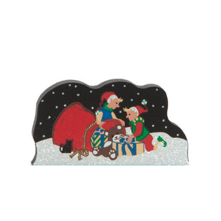 3/4" thick wooden replica with an illustration with Santa Claus and reindeer on a snowy background