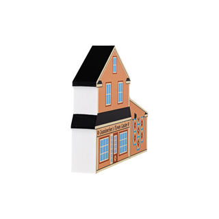3/4" thick wooden illustration of a orange house with a quilt
