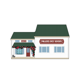 3/4" wooden cut out replica of a store called millers dry goods with flowers and quilts 