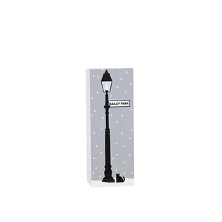 3/4" thick wooden replica with an illustration with a black street lamp design and 'Bailey Park' text on a gray polka dot background.