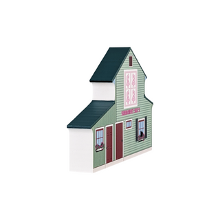 3/4" thick wooden illustration of a green building with a quilt