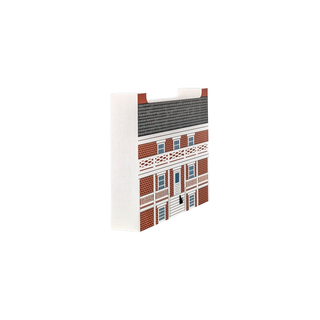 3/4" thick wooden illustration of a brick house on a white background