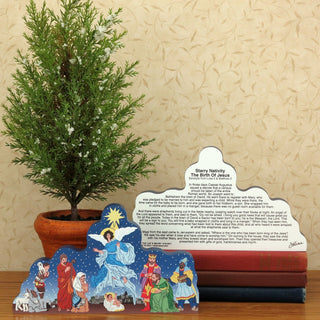 3/4" thick wooden illustration of a nativity scene and back model with text on a white background on a display table