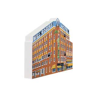 3/4" thick wooden replica with an illustration of a brick hotel facade with the words 'WILROE'S HOTEL' on a blue sign. The product is shown on a plain white background.