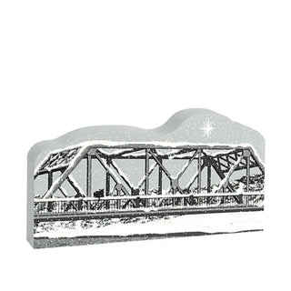 3/4" thick wooden replica with an illustration of a bridge with snow on a white background