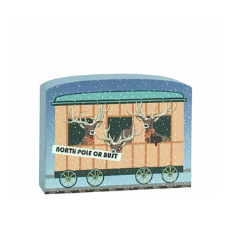 3/4" thick wooden replica with an illustration with reindeer design and 'North Pole or Bust' text on a white background