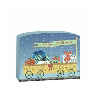 3/4" thick wooden replica with an illustration of a Decorative Christmas box with a festive design featuring presents and a banner saying 'Merry Christmas'.
