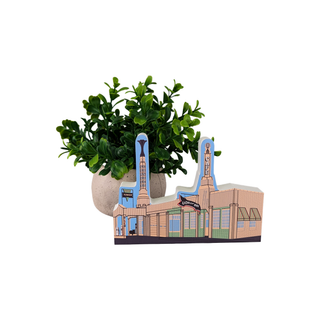 3/4" thick Model of a building with a plant on a white background