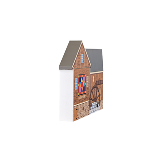 3/4" thick wooden illustration of a mill with a quilt
