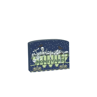 Decorative 3/4" thick wooden cutout with skeletons and 'Boneyard' text on a blue background