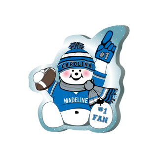 Cartoon snowman wearing a Carolina-themed outfit with a football, '#1' glove, and 'Madeline #1 Fan' sign.