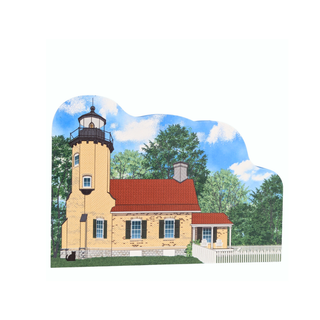 Illustration of a lighthouse with a blue sky and trees in the background