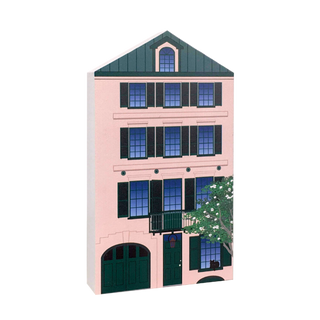 3/4" thick wooden model of a three-story building with green roof and pink walls on a white background