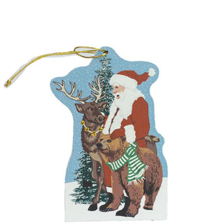 Decorative ornament with Santa Claus and animals on a blue background