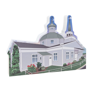 wooden replica with an illustration of a church with two towers 
