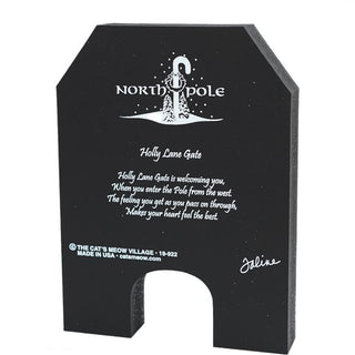 Black archway product back with 'North Pole' and 'Cat's Meow Village' branding on a white background