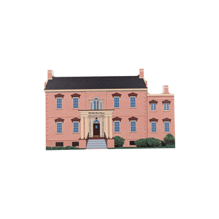 3/4" wooden replica with an illustration of a pink mansion with a black roof on a white background