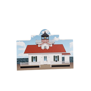 3/4" wooden replica with an illustration of a white lighthouse with a red roof 
