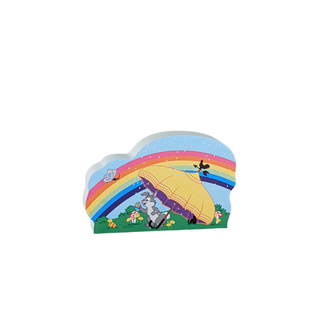 3/4" thick wooden replica with an illustration with a rainbow and cartoon characters on a white background